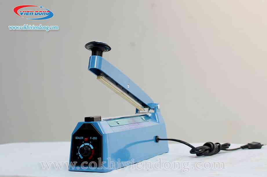 máy hàn miệng túi dập tay 